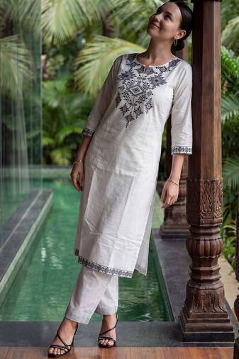Women Embroidered Thread Work Cotton Kurta with Trousers