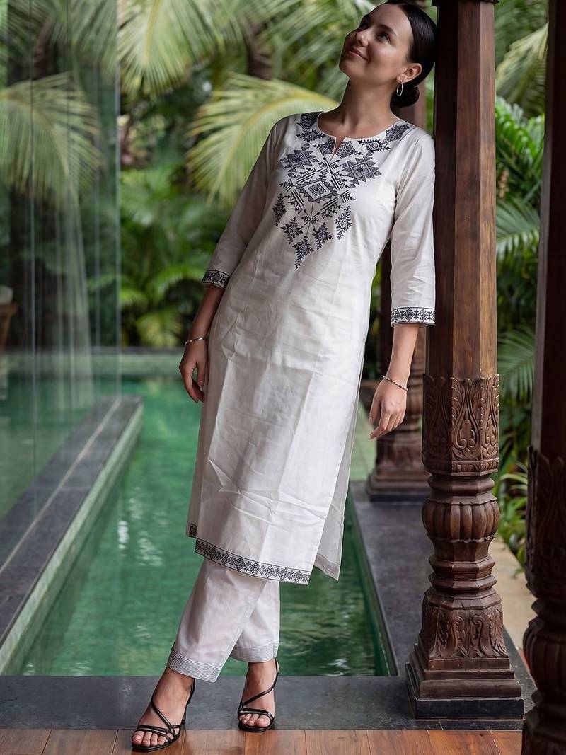 Women Embroidered Thread Work Cotton Kurta with Trousers