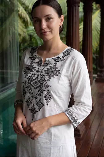 Women Embroidered Thread Work Cotton Kurta with Trousers