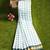 White checked cotton saree with green border