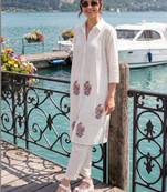 Women Floral Printed Pleated Cotton Kurta with Trousers