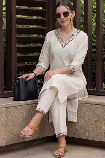 Women Ethnic Motifs Embroidered Mirror Work Kurta with Trousers