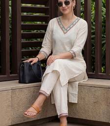 Women Ethnic Motifs Embroidered Mirror Work Kurta with Trousers