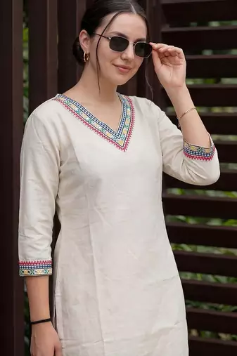 Women Ethnic Motifs Embroidered Mirror Work Kurta with Trousers