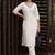Women Ethnic Motifs Embroidered Mirror Work Kurta with Trousers
