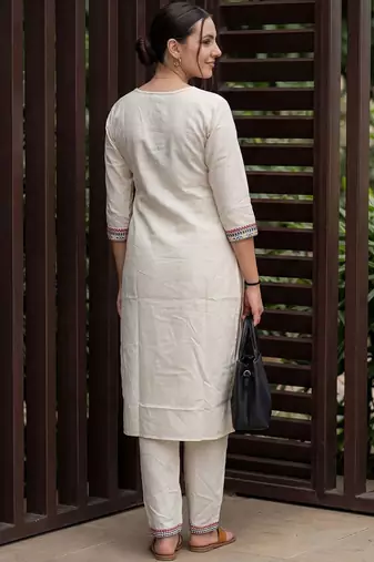 Women Ethnic Motifs Embroidered Mirror Work Kurta with Trousers