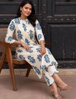 Women Floral Printed Cotton Kurta with Trousers 5