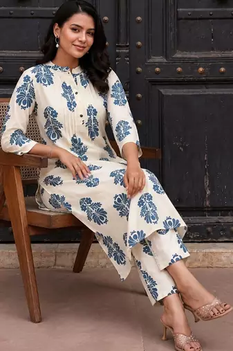 Women Floral Printed Cotton Kurta with Trousers