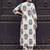 Women Floral Printed Cotton Kurta with Trousers