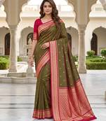 Green soft silk blend saree with zari weaving meenakari design