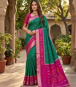 Sea green soft silk blend pochampalli saree with zari weaving meenakari design