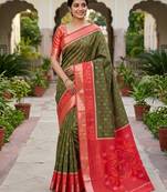 Green soft silk blend pochampalli saree with zari weaving meenakari design