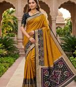 Golden soft silk blend pochampalli saree with zari weaving meenakari design