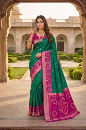 Sea green soft silk blend pochampalli saree with zari weaving meenakari design