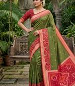 Green soft silk blend pochampalli saree with zari weaving meenakari design