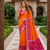 Orange soft silk blend pochampalli saree with zari weaving meenakari design
