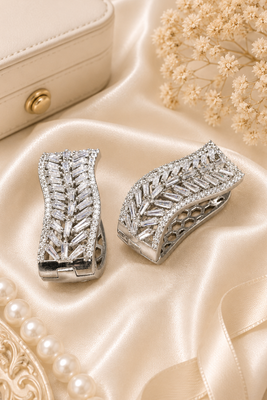 silver color rhodium finish elegant curved american diamond hoop earrings 1