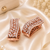 Rose gold finish elegant curved american diamond hoop earrings