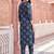 Women Floral Printed Cotton Kurta with Trousers