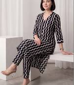 Women Printed Cotton Kurta with Trousers