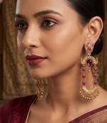 Gold-plated ethnic jewelry with magenta stones for women