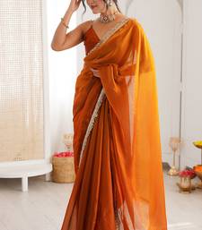 Orange fendy satin shaded with lace border saree with blouse
