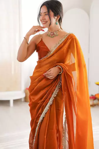 Orange fendy satin shaded with lace border saree with blouse