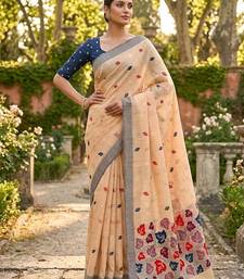 Light orange linen woven saree with blouse
