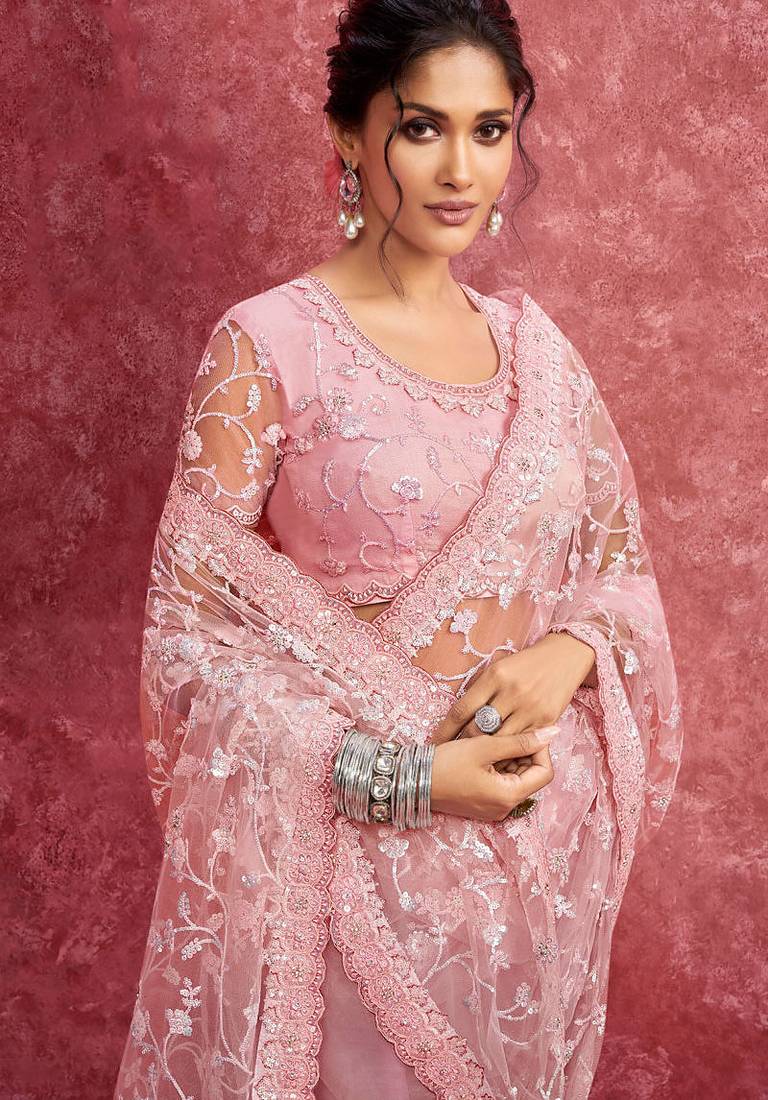 Pink net heavy embroidery with sequince work saree with blouse