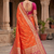Orange soft banarasi silk saree with zari weaving meenakari design