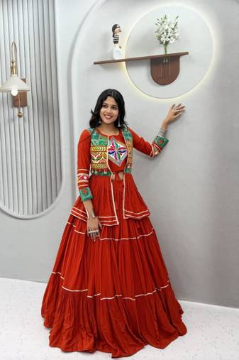 orange cotton silk embroidered traditional lehenga choli with free size upto 42