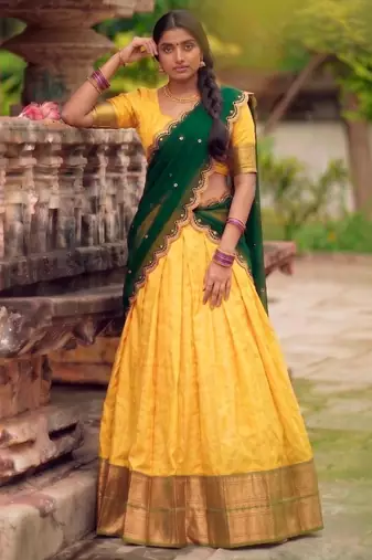yellow cotton silk woven traditional lehenga choli with free size upto 42
