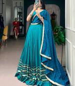 teal silk blend embroidered traditional lehenga choli with free size upto 42