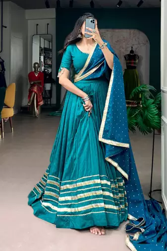 teal silk blend embroidered traditional lehenga choli with free size upto 42