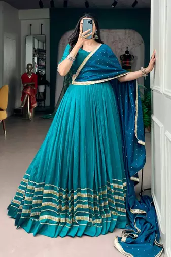 teal silk blend embroidered traditional lehenga choli with free size upto 42