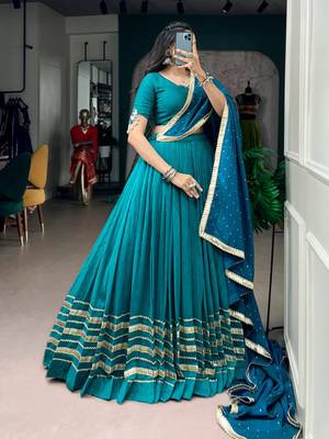 teal silk blend embroidered traditional lehenga choli with free size upto 42 4