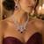 ruby red bridal jewellery set, cz diamond statement necklace, chandelier earrings, silver wedding jewellery