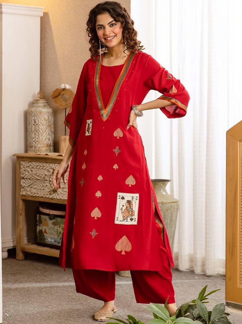 Women Ethnic Motifs Embroidered Thread Work Kurta with Trousers