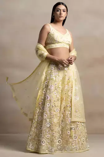 yellow net embroidered traditional lehenga choli