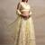 yellow net embroidered traditional lehenga choli