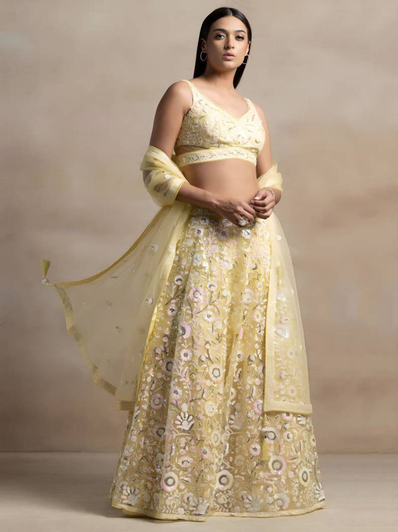 yellow net embroidered traditional lehenga choli