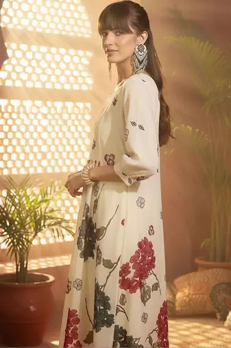 Women Floral Printed Beads and Stones Cotton Kurta with Trousers