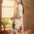 Women Floral Printed Beads and Stones Cotton Kurta with Trousers