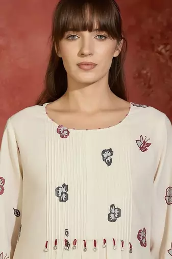 Women Floral Printed Beads and Stones Cotton Kurta with Trousers