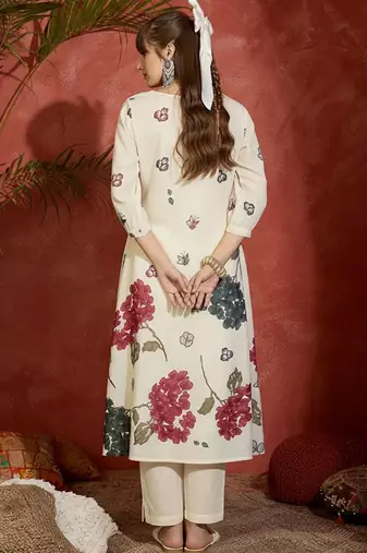 Women Floral Printed Beads and Stones Cotton Kurta with Trousers