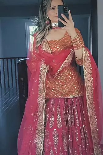 orange and pink faux georgette embroidered lehenga choli stitched