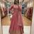 Pink faux georgette embroidered flared gown set