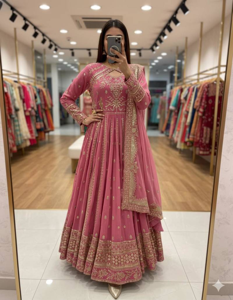 Pink faux georgette embroidered flared gown set