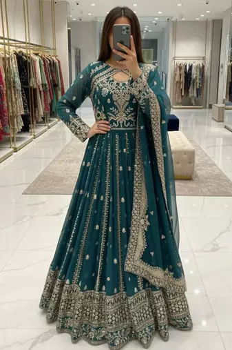 Green faux georgette embroidered flared gown set
