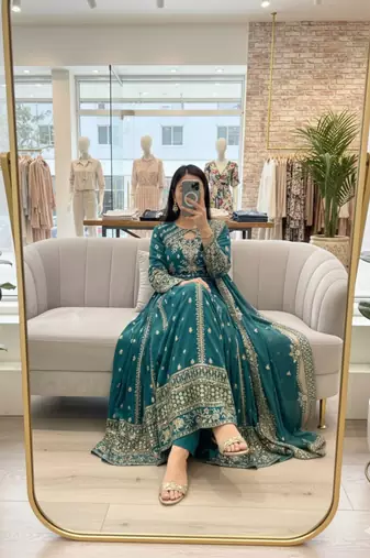 Green faux georgette embroidered flared gown set